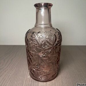 VINTAGE CANADA EMBOSSES WITH FLOWERS PURPLE GLASS BOTTLE DECOR WITH NO CORK